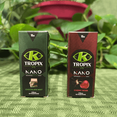 Two Tropix Nano packaging boxes on a textured green surface with plants in the background.
