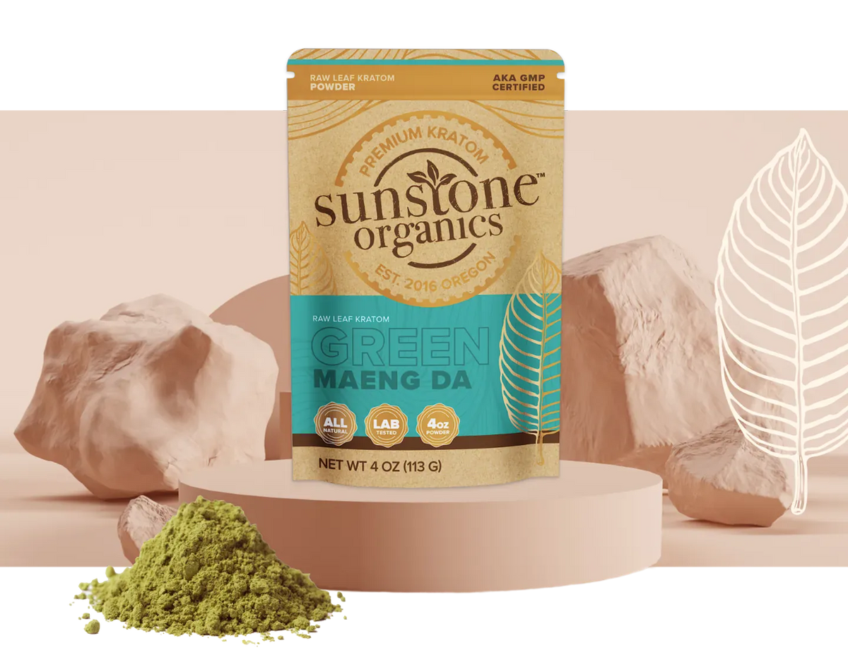 A bag of Sunstone Organics Green Maeng Da kratom beside a pile of the powder