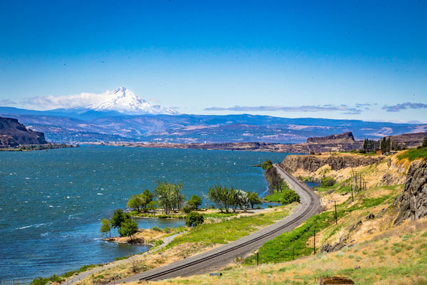 A road along the Columbia River with Mount Hood in the distance, Oregon