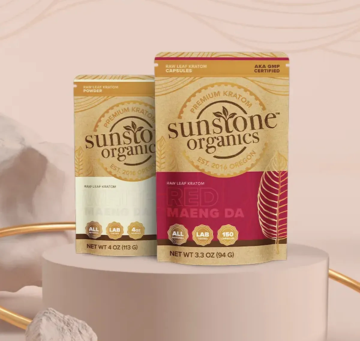 Sunstone Organics kratom packaging on a pink background