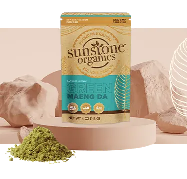 Sunstone Organics Green Meang Da kratom packaging with kratom powder on a beige background
